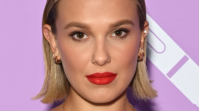 Millie Bobby Brown smirking