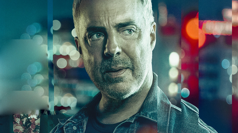 Titus Welliver looking around