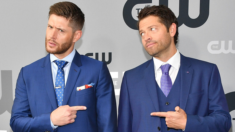Ackles and Collins pointing at each other