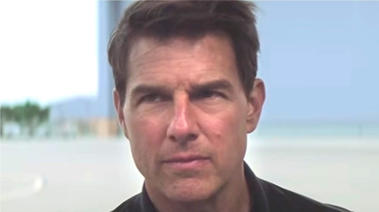 Tom Cruise in dark shirt