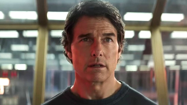 Ethan Hunt with red light shining on him in Mission: Impossible - The Final Reckoning