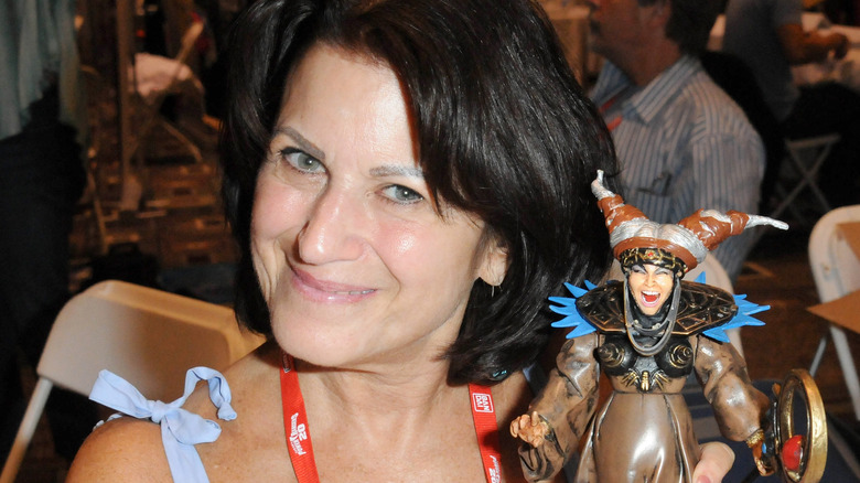 Barbara Goodson holding a Rita Repulsa figure