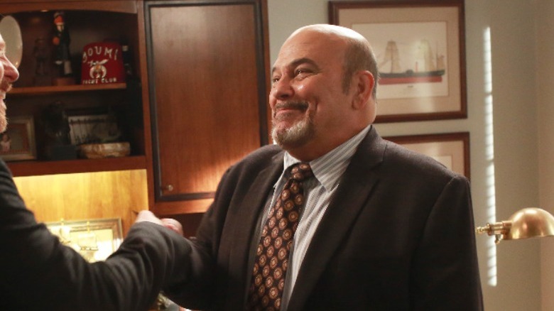 Jon Polito shaking hands