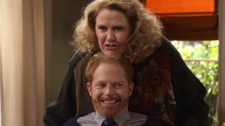 Barb Tucker holding onto Mitch Pritchett