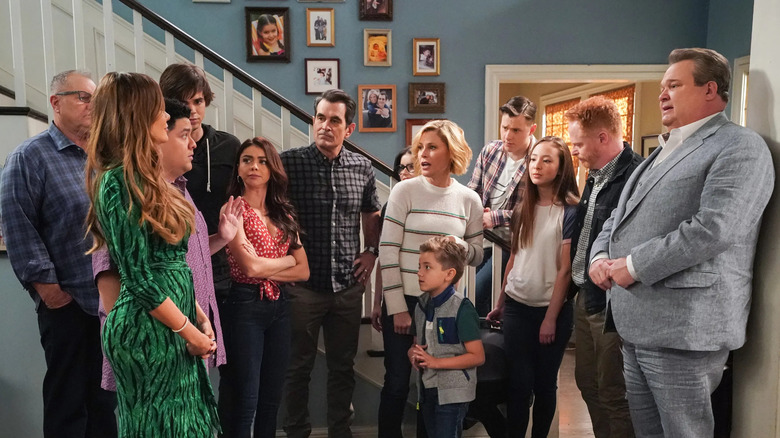 Modern Family cast by stairs