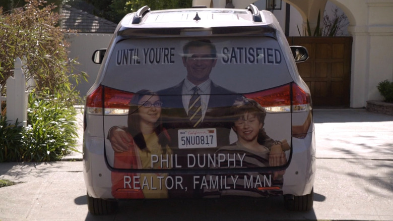 Phil Dunphy ad on the family van on "Modern Family"