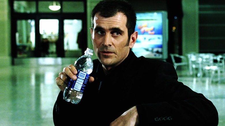 Steve holding a water bottle in "Dawn of the Dead"