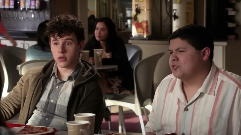 Manny and Luke sitting and eating