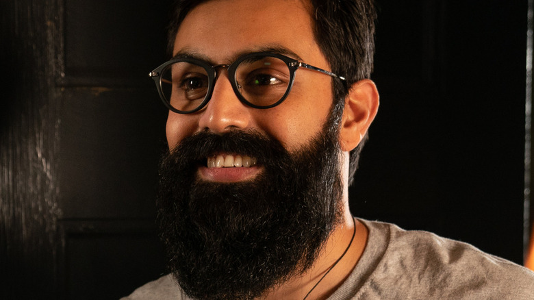 Saagar Shaikh as Aamir smiling in Ms. Marvel