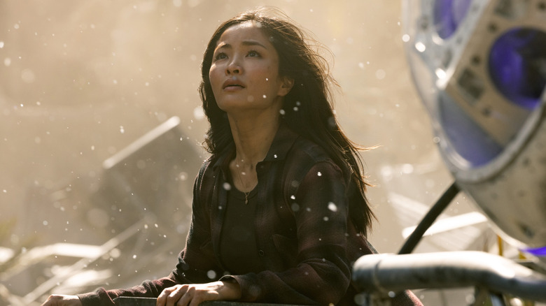 Cate Randa looking up with an amazed expression on Monarch: Legacy of Monsters