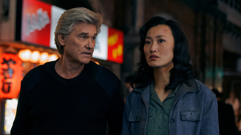 Lee Shaw and Keiko Miura walking on a street on Monarch: Legacy of Monsters