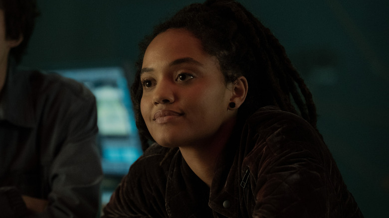 May Olowe-Hewitt looking thoughtful on Monarch: Legacy of Monsters