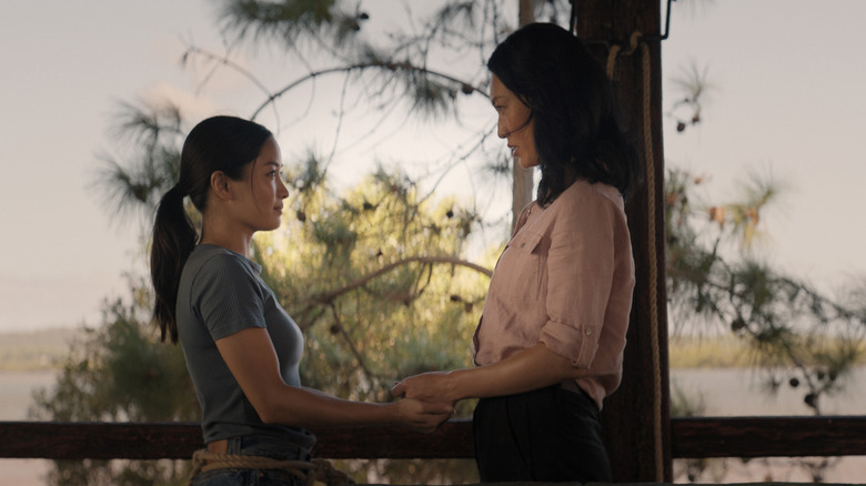 Cate Randa and Keiko Miura holding hands on Monarch: Legacy of Monsters