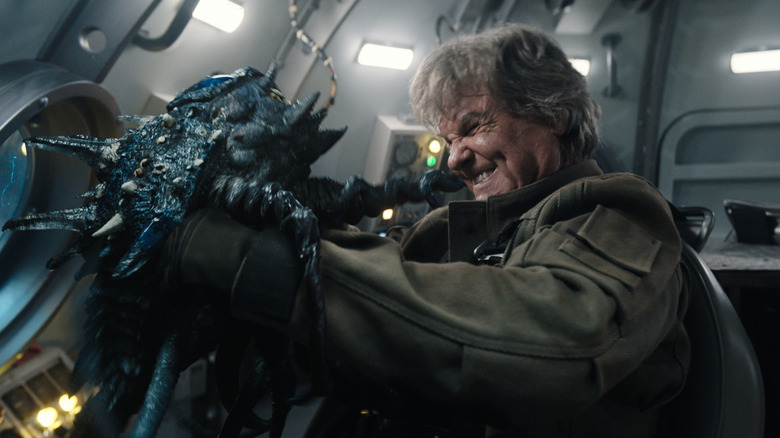Lee Shaw fighting a sea scarab on Monarch: Legacy of Monsters