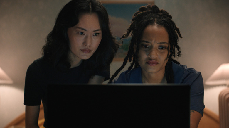 Keiko Miura and May Olowe-Hewitt looking at a computer screen on Monarch: Legacy of Monsters