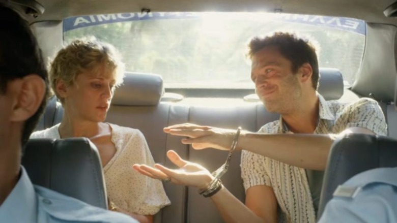 Sebastian Stan and Denise Gough in a car in Monday 