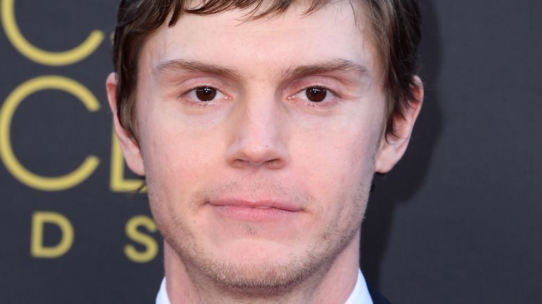 Evan Peters smirking 