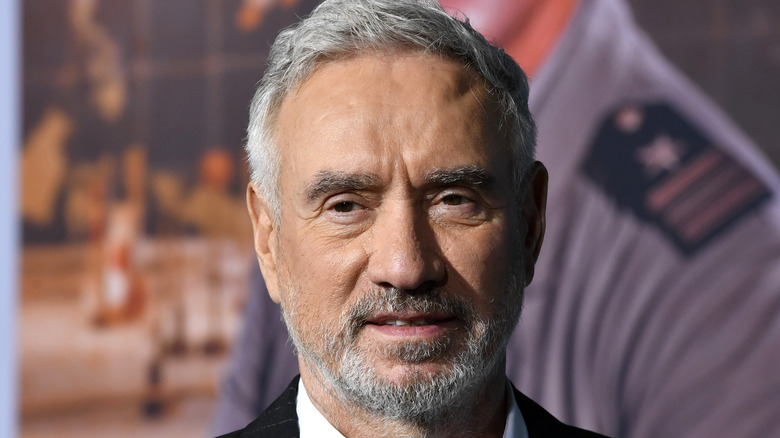 Roland Emmerich posing at Midway premiere