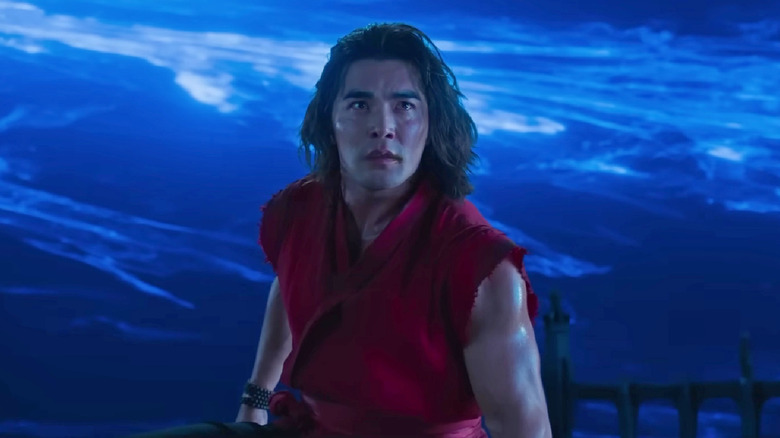 Liu Kang standing in front of a blue portal in "Mortal Kombat 2" (2026)