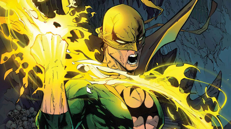 Iron Fist holding his glowing fist in Iron Fist: Heart of the Dragon