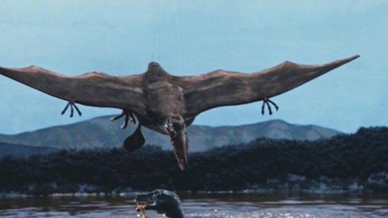 Dinosaur swoops down