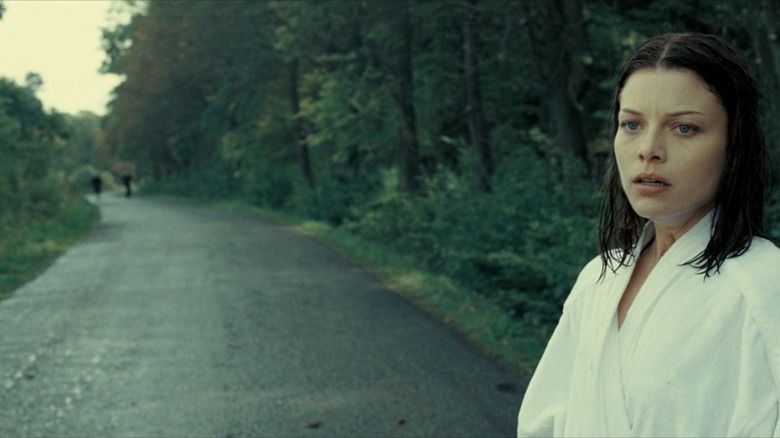 Beth Salinger looking over a mostly vacant road in Hostel: Part II (2007)