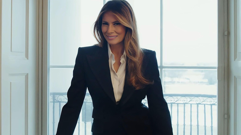 Melania Trump walking into a room in "Melania"