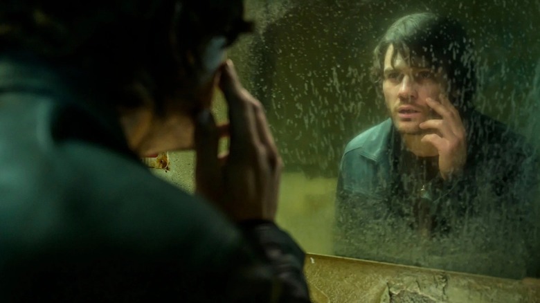 James Sunderland inspecting himself in the mirror in "Return to Silent Hill"