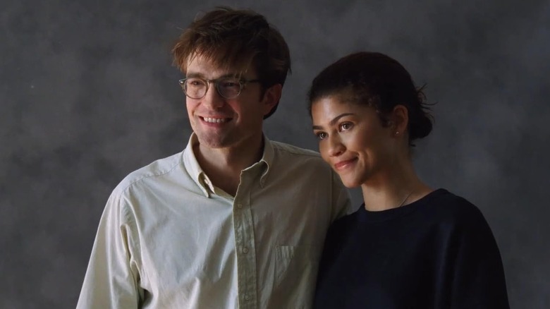 Charlie and Emma posing for photos in "The Drama"
