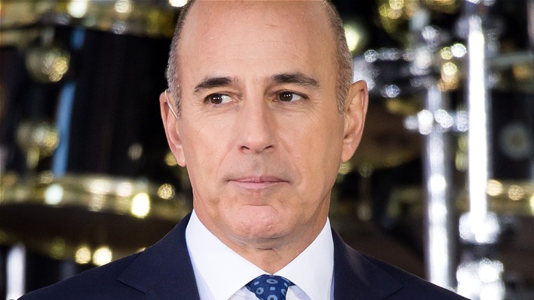 Matt Lauer looking serious at an event