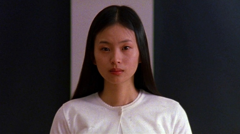 Asami looking nervous at the camera in Audition