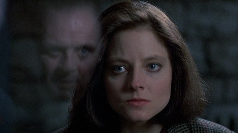 Clarice looking at Hannibal through glass in "The Silence of the Lambs"