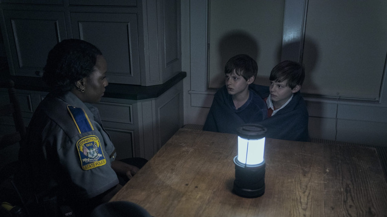 Elias and Lukas talking to a cop