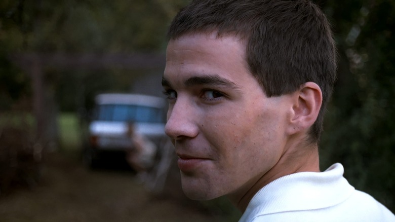 Paul smiles at the camera in "Funny Games"
