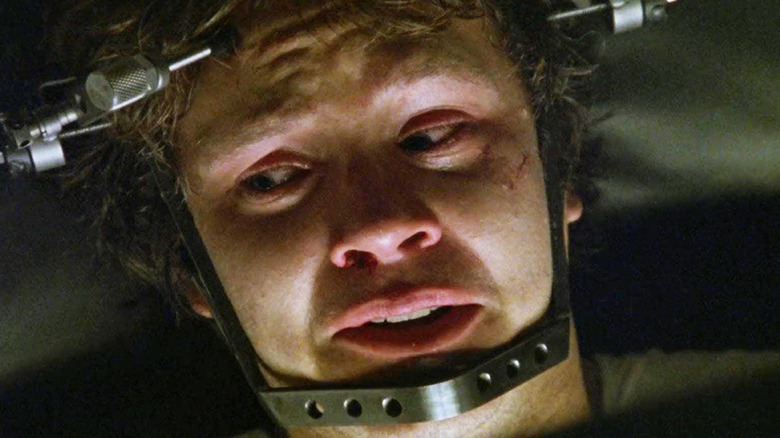 Jacob wearing a metal helmet in "Jacob's Ladder"