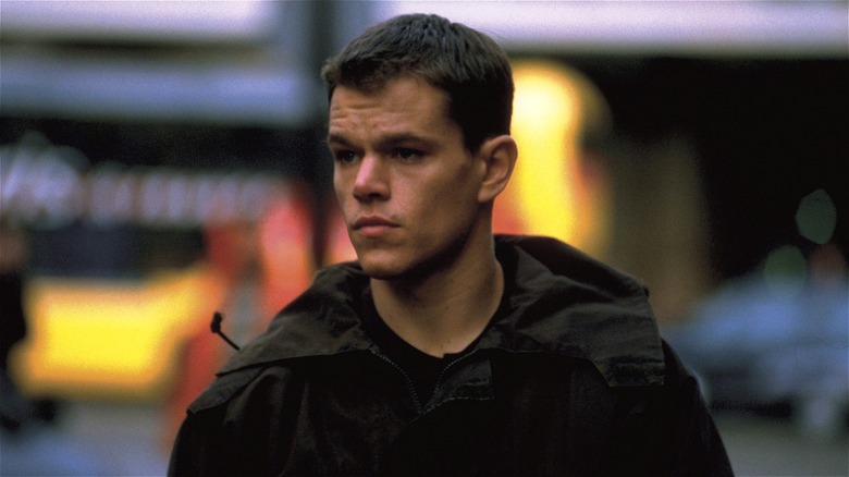 Jason Bourne walking in city