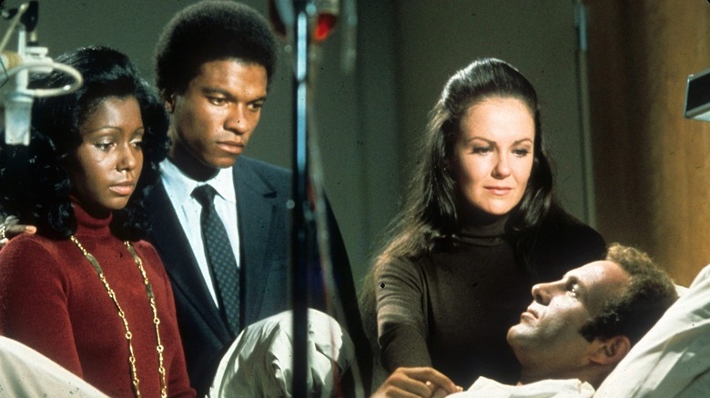 Gale and family visiting Brian in hospital in Brian's Song (1971)