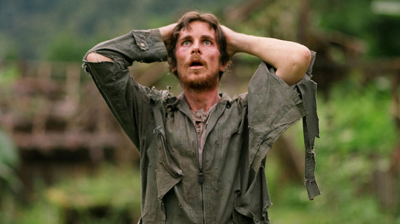 Dieter Dengler with his hands on his head in Rescue Dawn (2006)