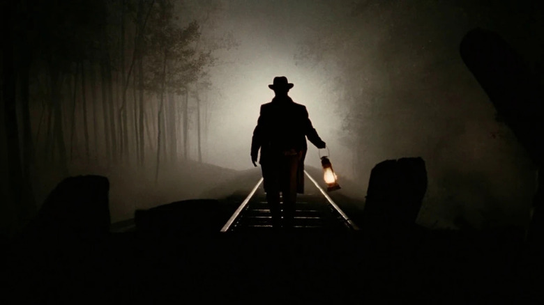 Jesse James preparing for the big train heist in The Assassination of Jesse James (2007)