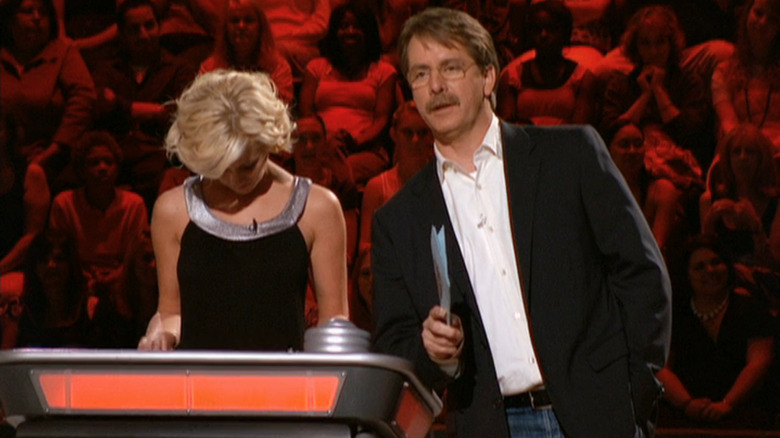 Kellie Pickler at her podium next to Jeff Foxworthy