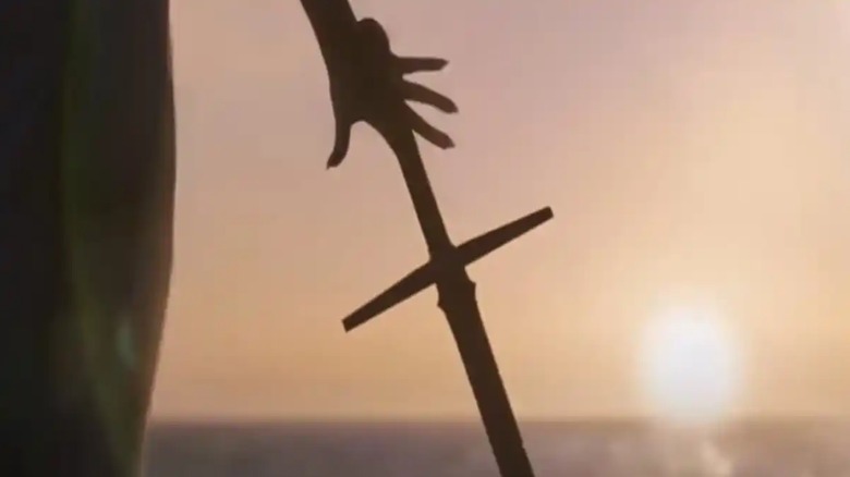 Gorr grasping All-Black the Necrosword in "Thor: Love and Thunder"