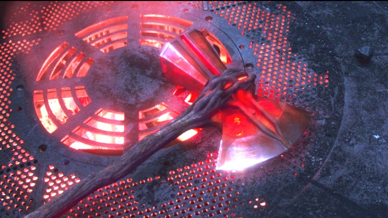 The newly forged Stormbreaker cooling on the floor in "Avengers: Infinity War"