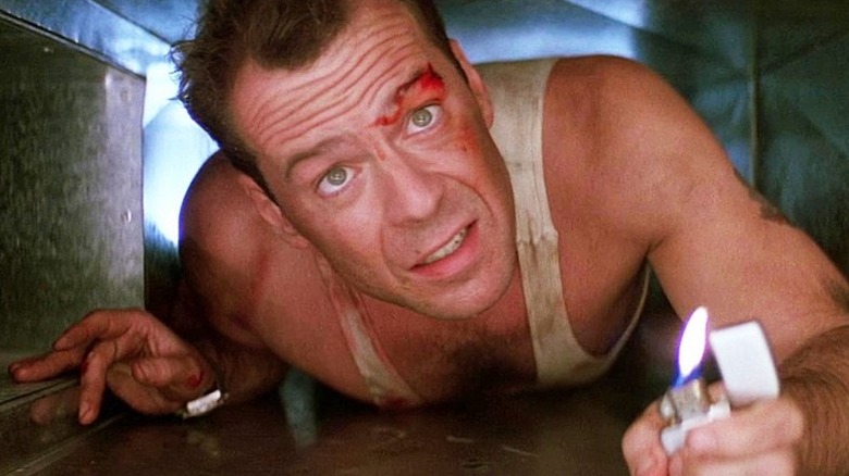 John McClane crawls through an air duct in "Die Hard"