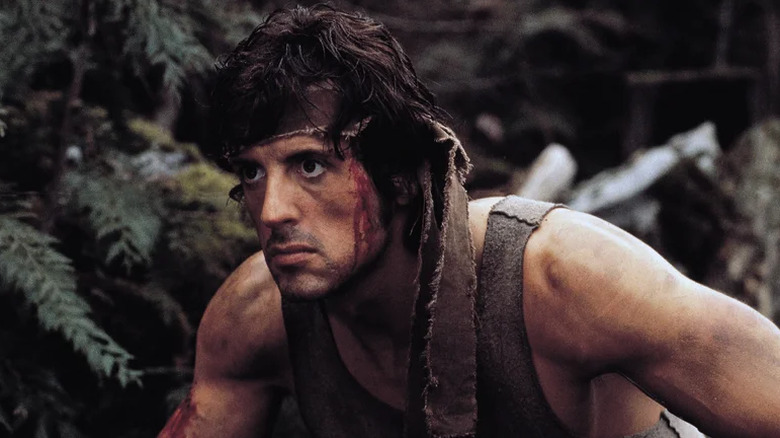 John Rambo bloody in the woods in "First Blood"
