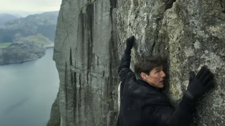 Ethan Hunt clings to the side of the rock wall in "Mission: Impossible — Fallout"