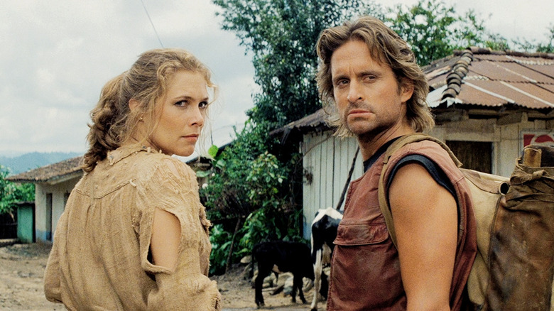 Joan and Jack frowning in "Romancing the Stone."