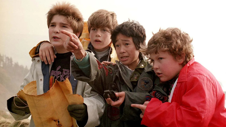 Mouth, Mikey, Data, and Chunk frowning in "The Goonies."