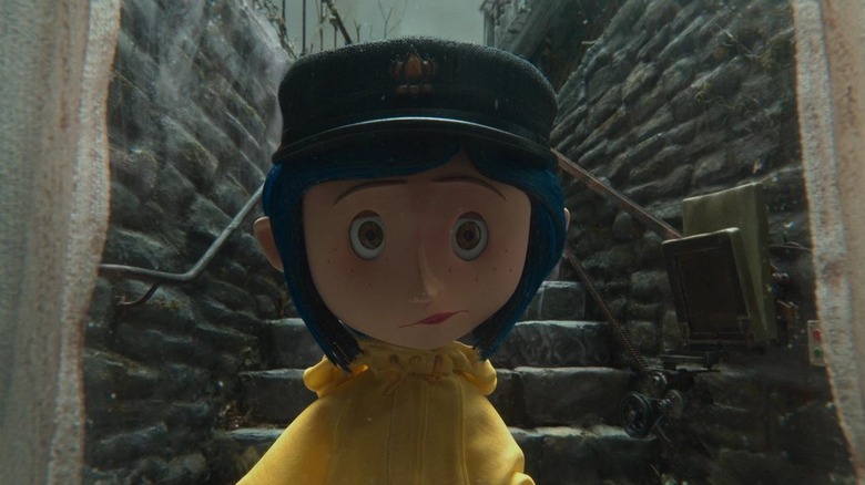 Coraline walks down a stairwell in Coraline