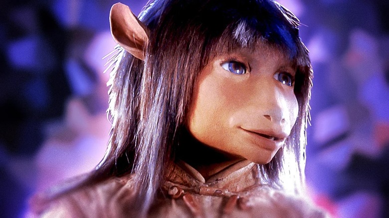 Jen with a purple background in The Dark Crystal