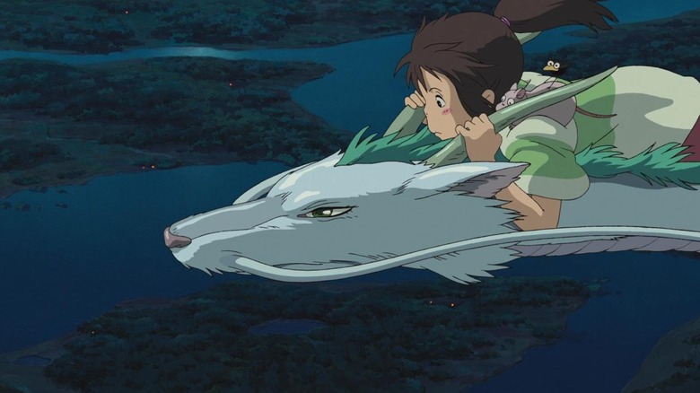 Chihiro Ogino with Haku in Spirited Away